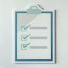 Cut out paper checklist icon